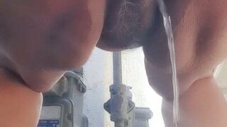 Hairy pussy had to piss in a public setting.  Mature woman