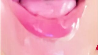 Playing with a mouthful of cum!