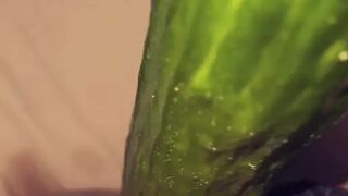 Swiss girl fucks herself with a cucumber