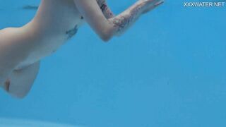 Finnish teen babe Mimi Cica cutest pornstar with tattoos in swimming pool nude