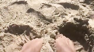 BIG FEET playing in the sand