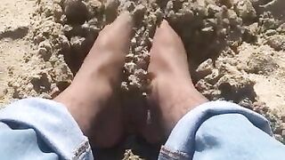 BIG FEET playing in the sand