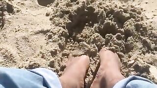 BIG FEET playing in the sand