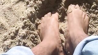 BIG FEET playing in the sand