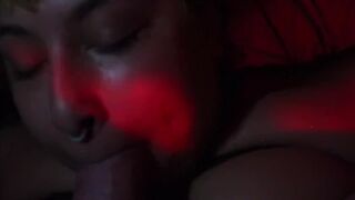 Fat Latina sucking thick white cock on back. Cum all over her face