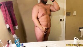 Just a fat guy showing off his body.