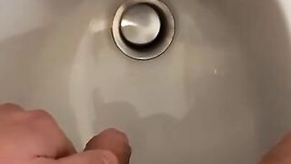 Pissing on my hand with my small dick