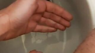 Pissing on my hand with my small dick