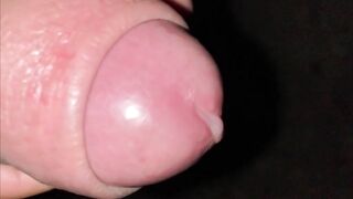 SLOW MOTION close up cumshot and foreskin pulling back and forth