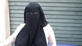 naked in Niqab in the hot tub