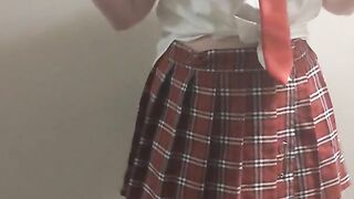 Amateur Stripping and Teasing School Uniform while Wearing an Anal Plug