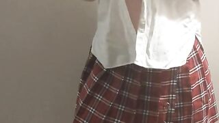 Amateur Stripping and Teasing School Uniform while Wearing an Anal Plug