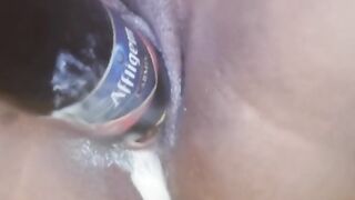 She Fucks her Pussy with a Bottle of Cold Beer and her Pussy Gets Creamy