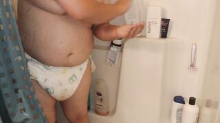 Getting Wet Taking Shower in Soaking Wet Diaper