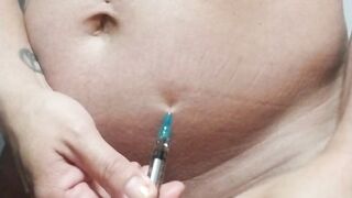 Ftm takes injection in cubby tummy