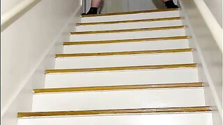 Mrs. A pee's on the stairs