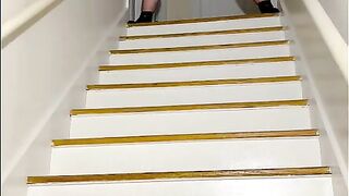 Mrs. A pee's on the stairs