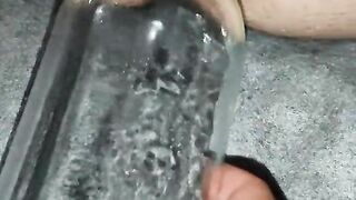 Bottle Glass in his ass