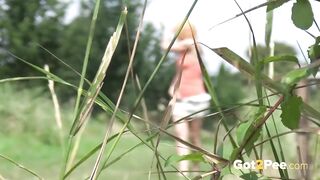 Pretty Blonde Babe Pisses Off Bridge Into River