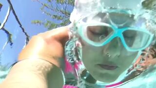 Slick body and pointed toes, pool socks and PVC swimming costumes