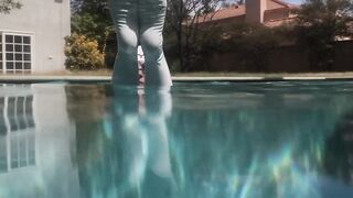 Slick body and pointed toes, pool socks and PVC swimming costumes