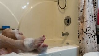 naked bubble bath feet