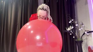 Looner girl in glasses and red PVC dress blow BIG red balloon and pop it with ass. DM to get full