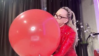 Looner girl in glasses and red PVC dress blow BIG red balloon and pop it with ass. DM to get full