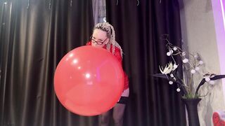 Looner girl in glasses and red PVC dress blow BIG red balloon and pop it with ass. DM to get full