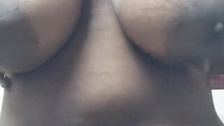 Tamil girl squeezing her big natural boobs. Busty Tamil ponnu