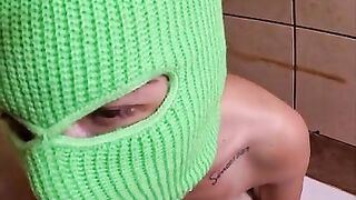 Ski mask girl smoking a cigarette and sucking cock