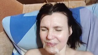 cum on my wife's face while she fucks herself with a dildo.