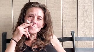 Everyone's favorite Aunt caught smoking and playing with her pussy on the porch.