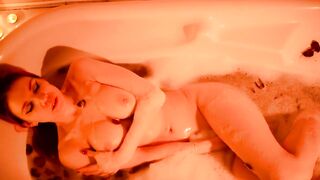 Masturbating while taking a bath