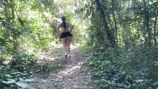 Big ass in a mini skirt walking in the woods