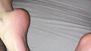 I get all Wet like a Slut while I give him a nice Footjob..