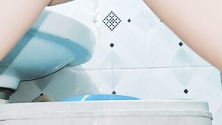 Hairy milf Pissing Standing in the Toilet